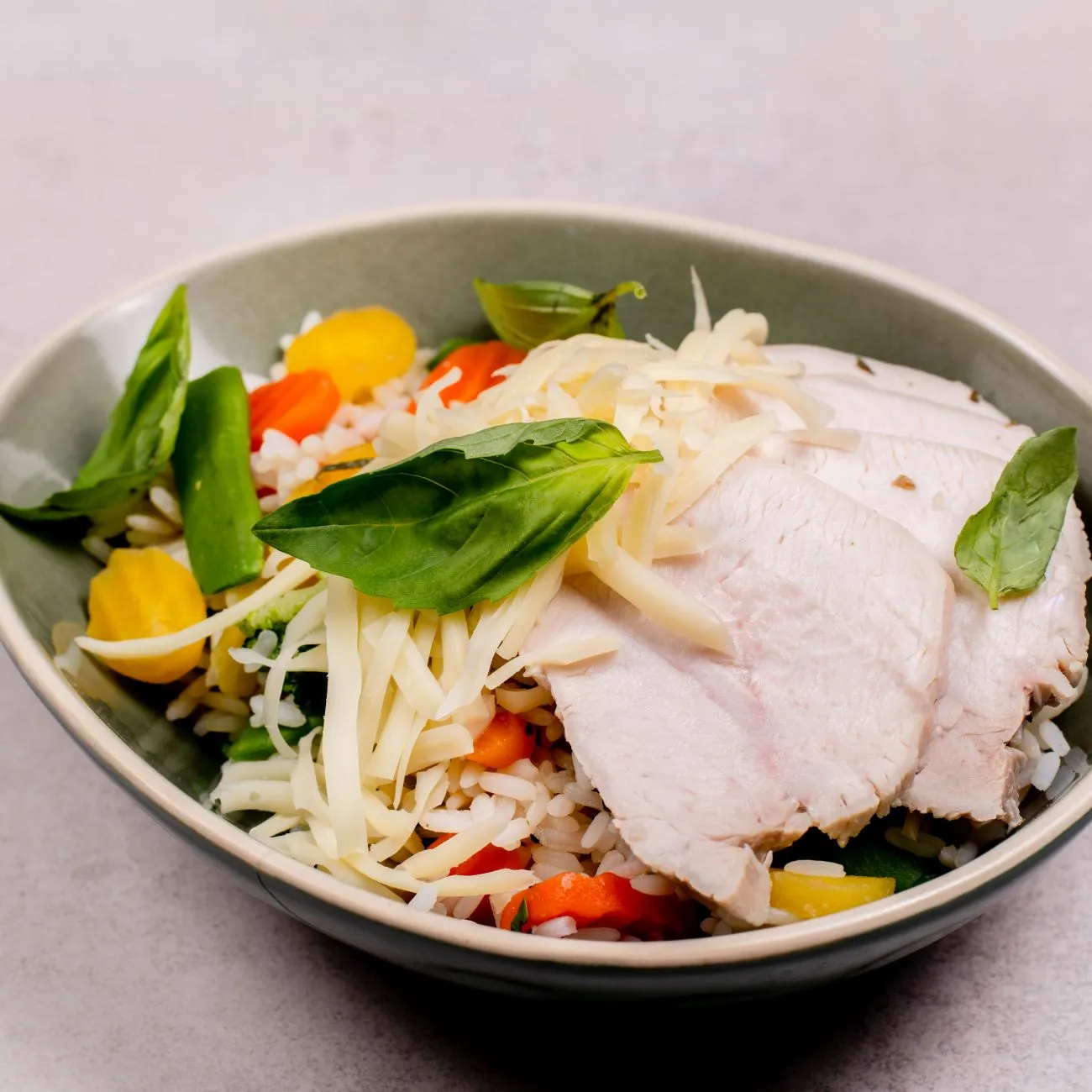 Risotto with turkey, vegetables and cheese